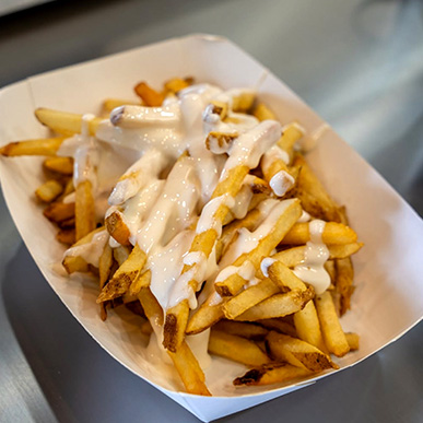 Loaded Cooper Fries Cooked In Beef Tallow